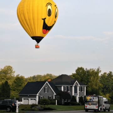Salem NH hot air balloon over residential neighborhood