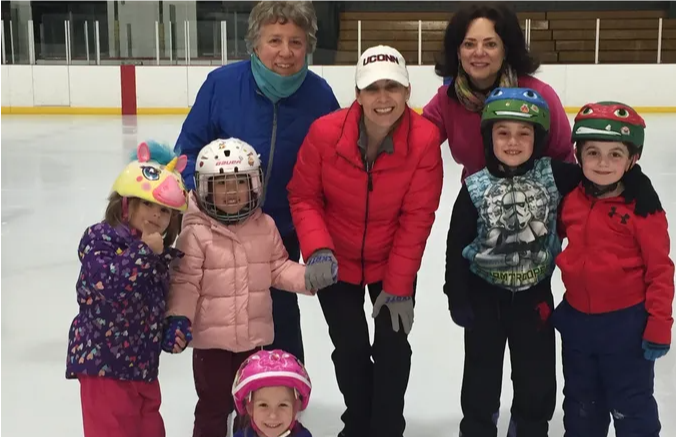 Instructor and students of The Ice Skating Academy at a Haverhill ice rink (Veterans Memorial Skating Rink)